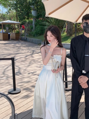 ByYou2025新款法式杏白色珠光醋酸缎面吊带连衣裙气质显瘦A字长裙