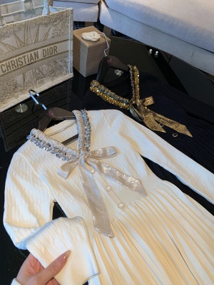 名媛蝴蝶结针织连衣裙女春秋新款小黑裙百褶打底裙子