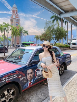 肌理感吊带连衣裙女新款白色裙子气质海边度假长裙